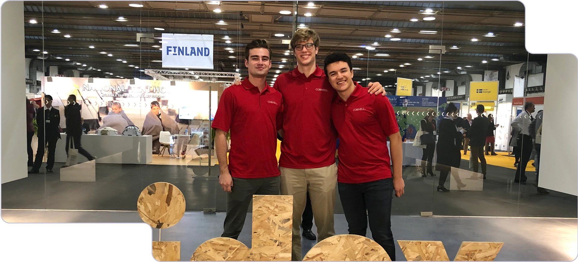 Three people at an aidex convention