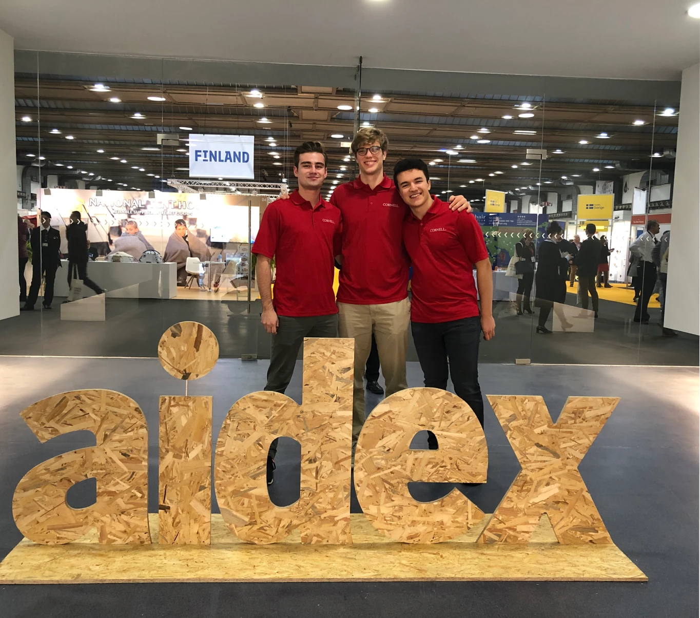 Three people at an aidex convention